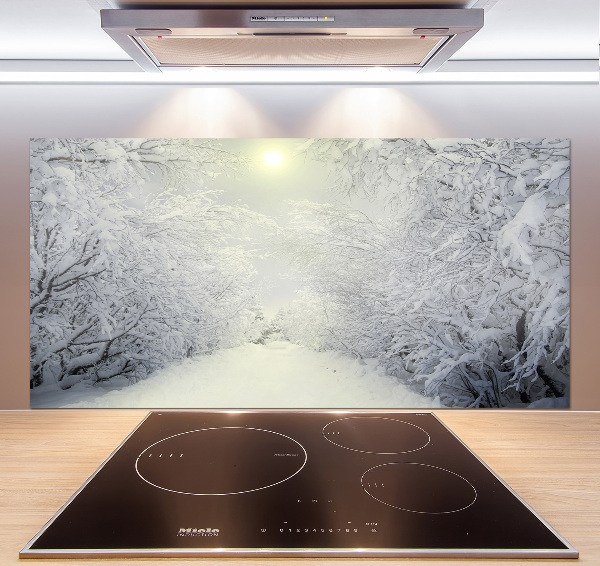 Rivestimento parete cucina con motivo di foresta invernale