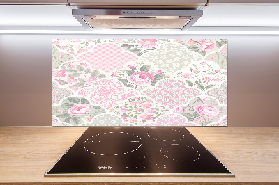 Rivestimento parete cucina con motivo di rose e ornamenti