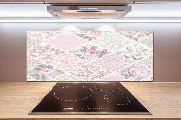 Rivestimento parete cucina con motivo di rose e ornamenti