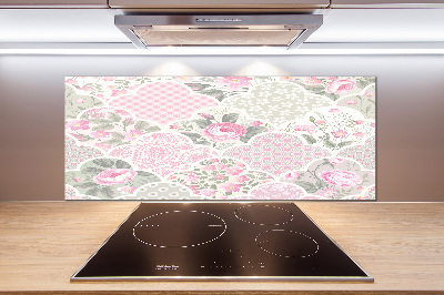 Rivestimento parete cucina con motivo di rose e ornamenti