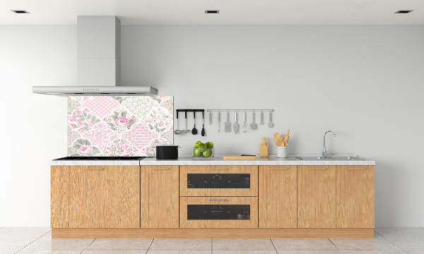 Rivestimento parete cucina con motivo di rose e ornamenti