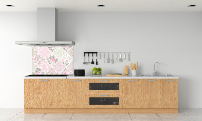 Rivestimento parete cucina con motivo di rose e ornamenti