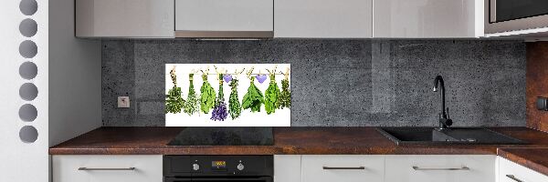 Rivestimento parete cucina con motivo di erbe aromatiche disposte su un filo