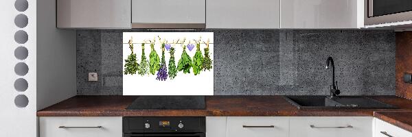 Rivestimento parete cucina con motivo di erbe aromatiche disposte su un filo