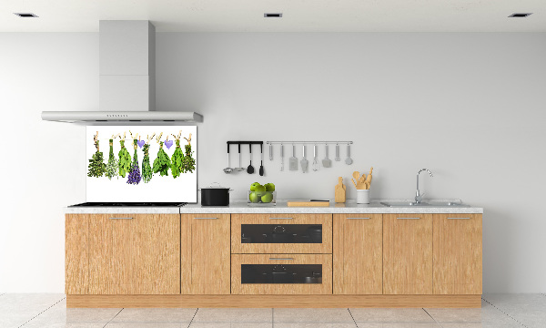 Rivestimento parete cucina con motivo di erbe aromatiche disposte su un filo