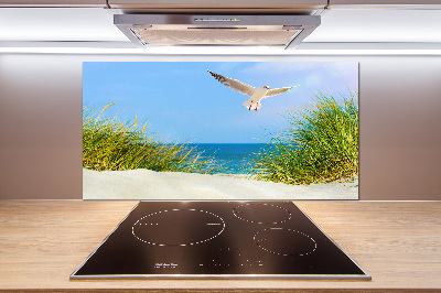Rivestimento parete cucina con decorazione raffigurante un gabbiano sulla spiaggia