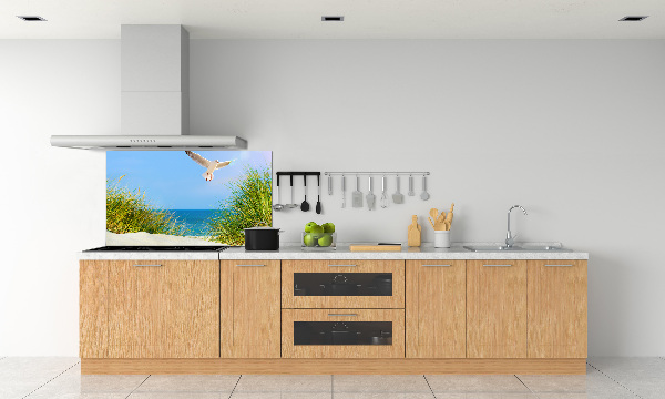 Rivestimento parete cucina con decorazione raffigurante un gabbiano sulla spiaggia