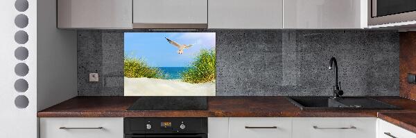 Rivestimento parete cucina con decorazione raffigurante un gabbiano sulla spiaggia