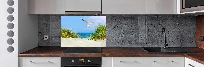 Rivestimento parete cucina con decorazione raffigurante un gabbiano sulla spiaggia