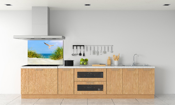 Rivestimento parete cucina con decorazione raffigurante un gabbiano sulla spiaggia