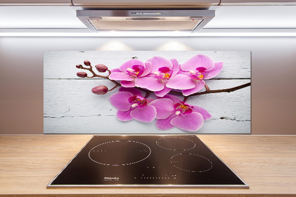 Pannello paraschizzi cucina con motivo di orchidea su sfondo effetto legno