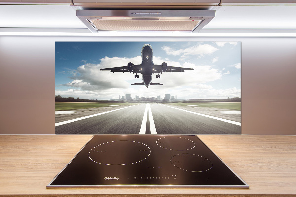Rivestimento parete cucina con stampa raffigurante un aereo in fase di decollo