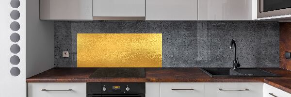 Rivestimento parete cucina con finitura in lamina d'oro