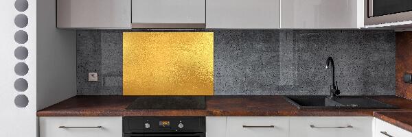 Rivestimento parete cucina con finitura in lamina d'oro