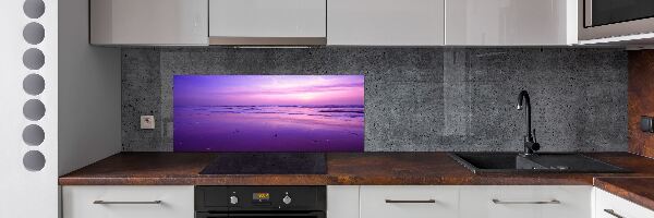 Rivestimento parete cucina con decorazione che richiama il tramonto sul mare con il sole