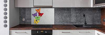 Rivestimento parete cucina con motivo di farfalle colorate