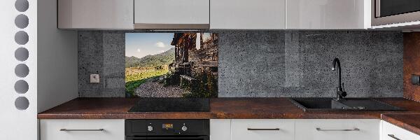 Pannello retrocucina con stampa a tema casa di legno in montagna