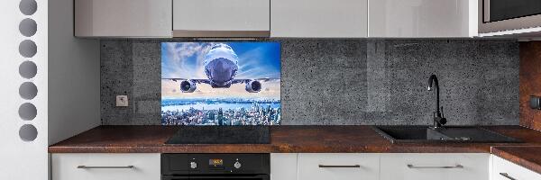 Pannello paraschizzi cucina con stampa raffigurante un aereo sopra la città