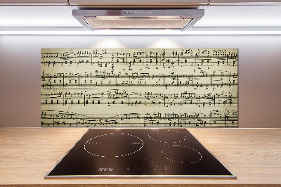 Pannello retrocucina con decorazione a motivo di note sul pentagramma