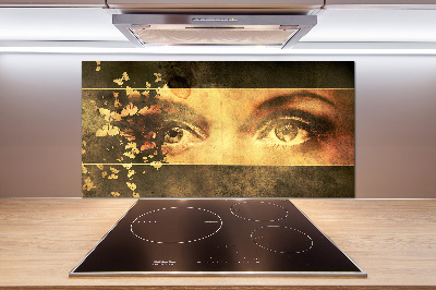 Rivestimento parete cucina con motivo di occhi e farfalle