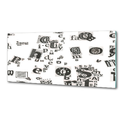 Pannello retrocucina con stampa delle lettere prese da un giornale