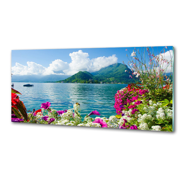 Pannello paraschizzi cucina con stampa a fiori sullo sfondo di un lago