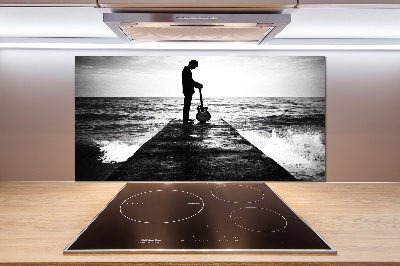 Rivestimento parete cucina con stampa raffigurante un chitarrista sul molo