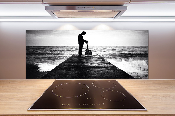 Rivestimento parete cucina con stampa raffigurante un chitarrista sul molo