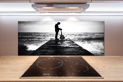 Rivestimento parete cucina con stampa raffigurante un chitarrista sul molo