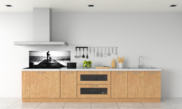 Rivestimento parete cucina con stampa raffigurante un chitarrista sul molo