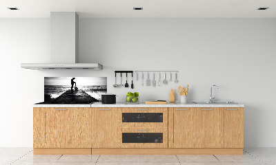 Rivestimento parete cucina con stampa raffigurante un chitarrista sul molo