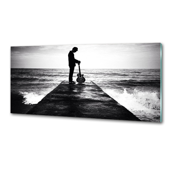 Rivestimento parete cucina con stampa raffigurante un chitarrista sul molo