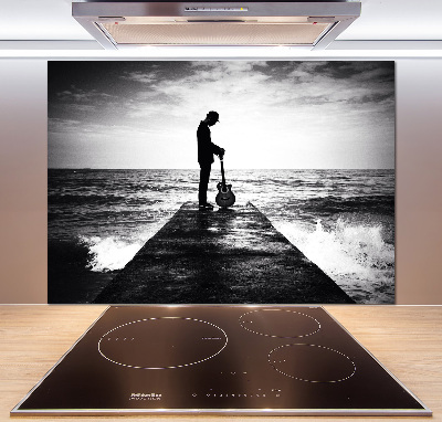 Rivestimento parete cucina con stampa raffigurante un chitarrista sul molo