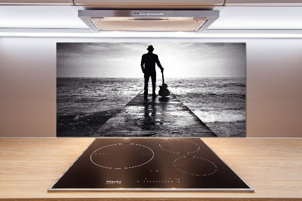 Pannello retrocucina con stampa raffigurante un chitarrista sul molo