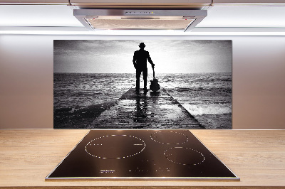 Pannello retrocucina con stampa raffigurante un chitarrista sul molo