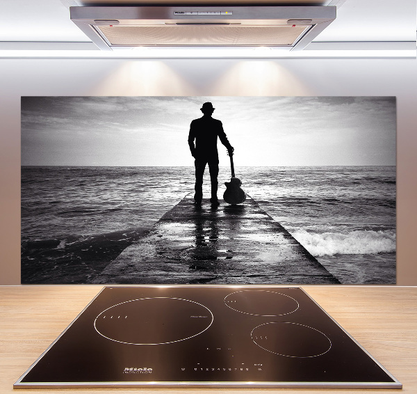 Pannello retrocucina con stampa raffigurante un chitarrista sul molo