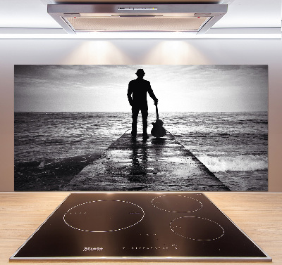 Pannello retrocucina con stampa raffigurante un chitarrista sul molo