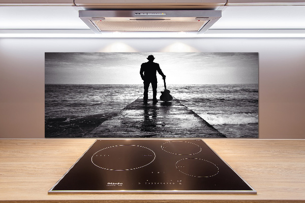 Pannello retrocucina con stampa raffigurante un chitarrista sul molo