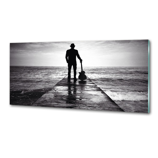 Pannello retrocucina con stampa raffigurante un chitarrista sul molo