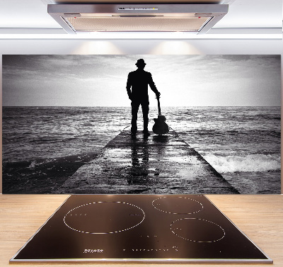 Pannello retrocucina con stampa raffigurante un chitarrista sul molo