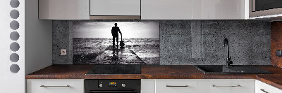 Pannello retrocucina con stampa raffigurante un chitarrista sul molo