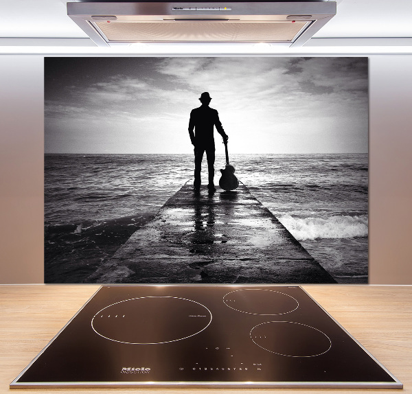 Pannello retrocucina con stampa raffigurante un chitarrista sul molo