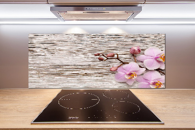 Pannello paraschizzi cucina con stampa di orchidee su motivo legno