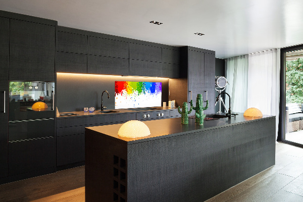 Pannello paraschizzi cucina con motivo di macchie arcobaleno