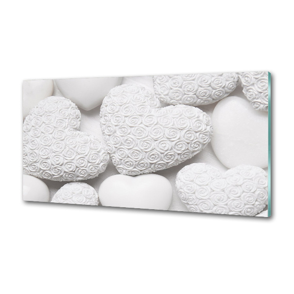 Rivestimento parete cucina con motivo a cuori bianchi