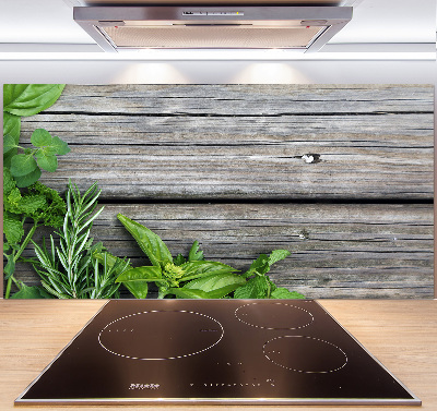 Pannello retrocucina con motivo di erbe aromatiche su sfondo in legno