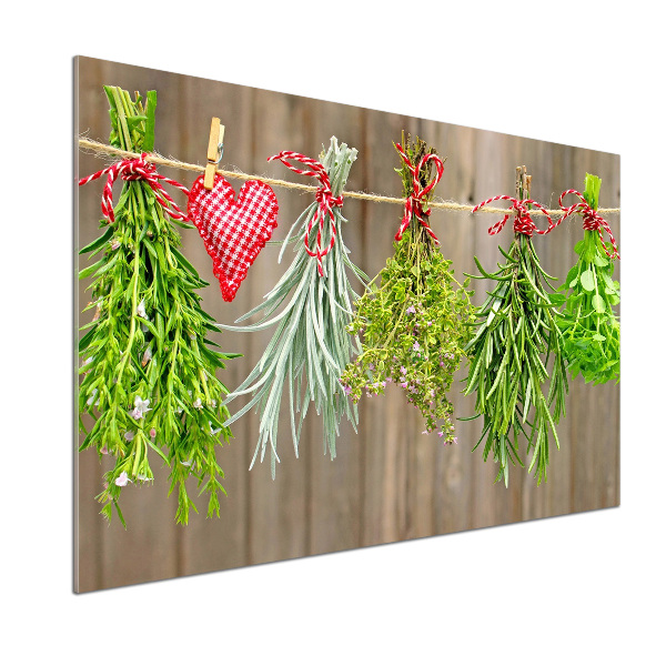 Rivestimento parete cucina con motivo di erbe aromatiche su un filo