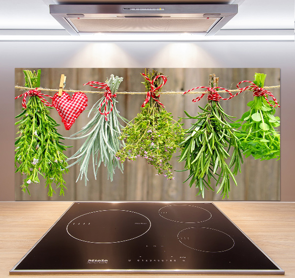 Rivestimento parete cucina con motivo di erbe aromatiche su un filo