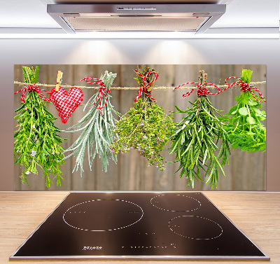 Rivestimento parete cucina con motivo di erbe aromatiche su un filo