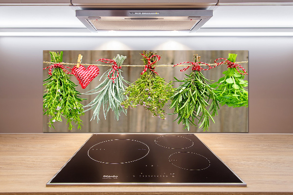 Rivestimento parete cucina con motivo di erbe aromatiche su un filo